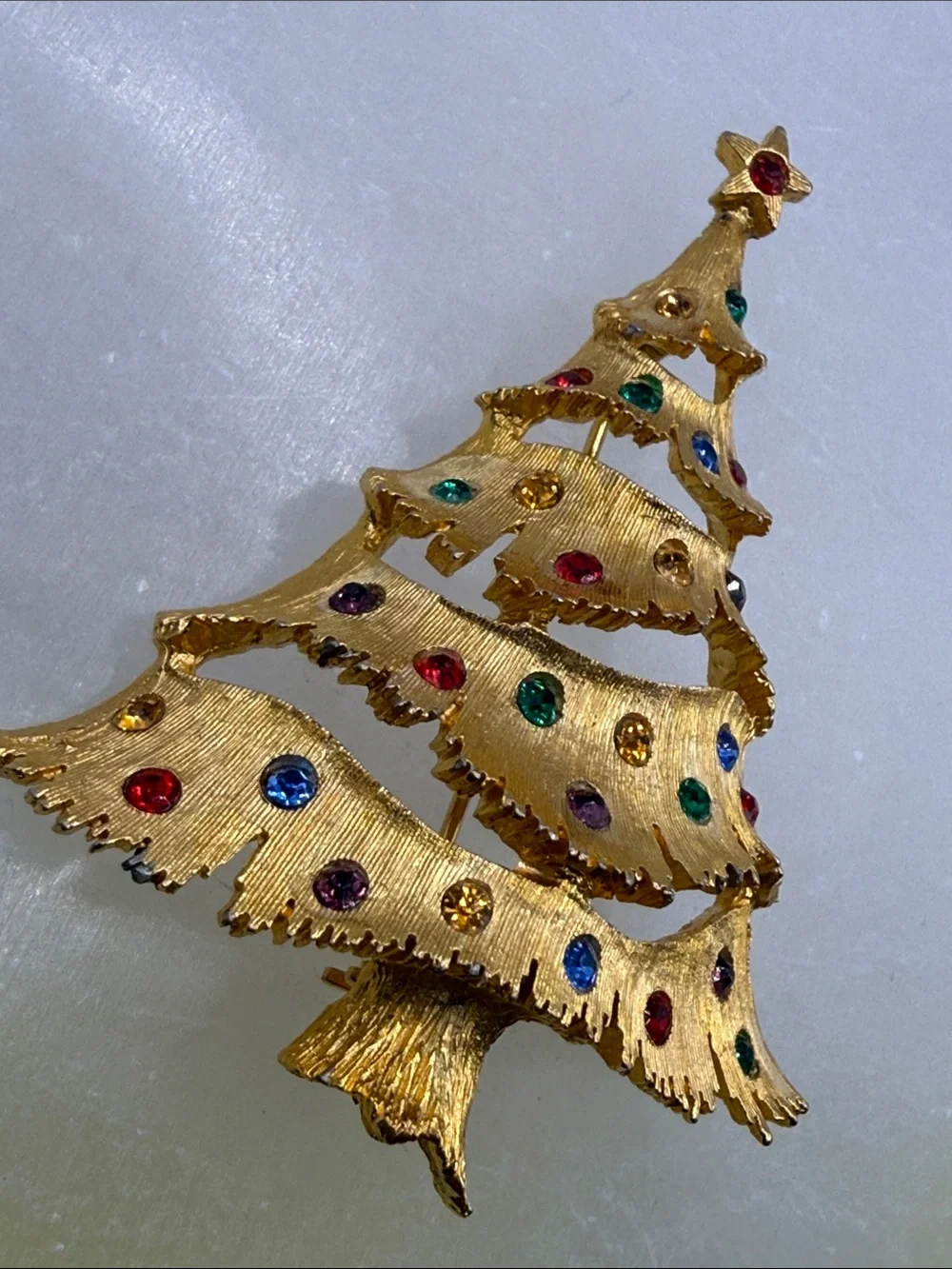 Vintage JJ Gold-tone Christmas Tree Pin with Multicolored Rhinestones
